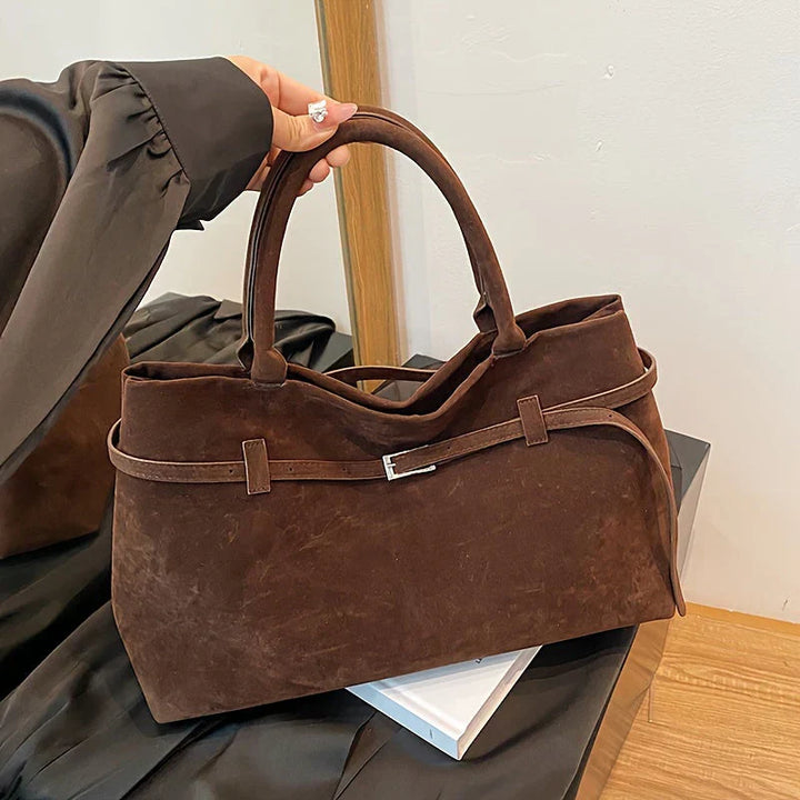 Valsenia Elegant bag with vintage suede belt