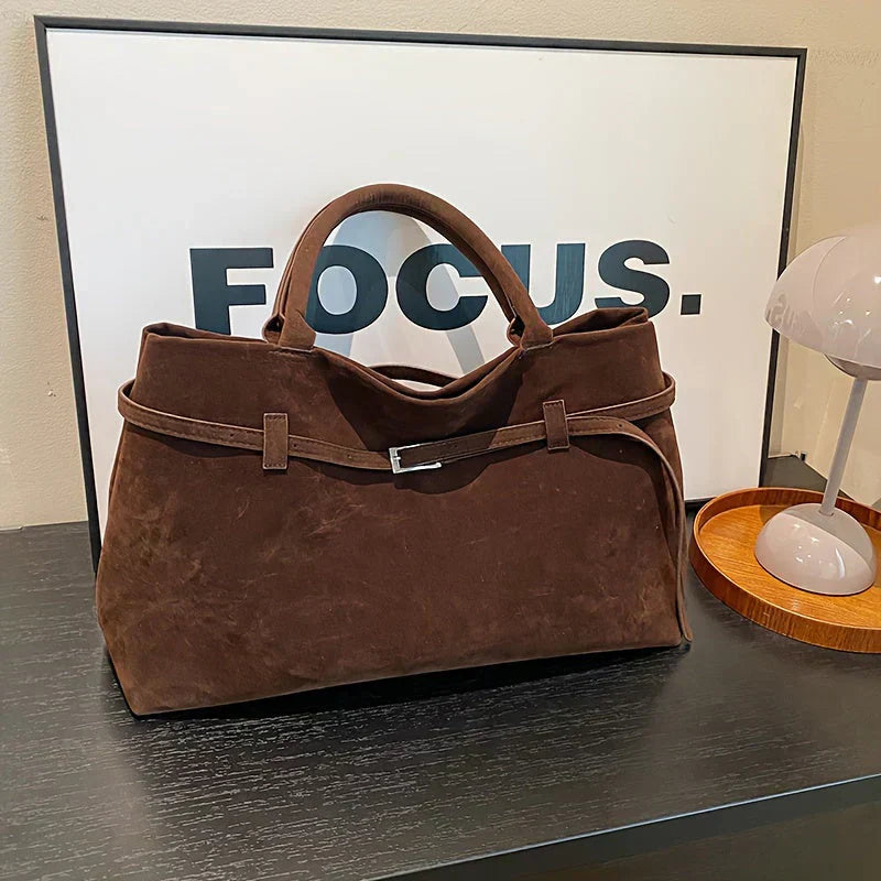 Valsenia Elegant bag with vintage suede belt
