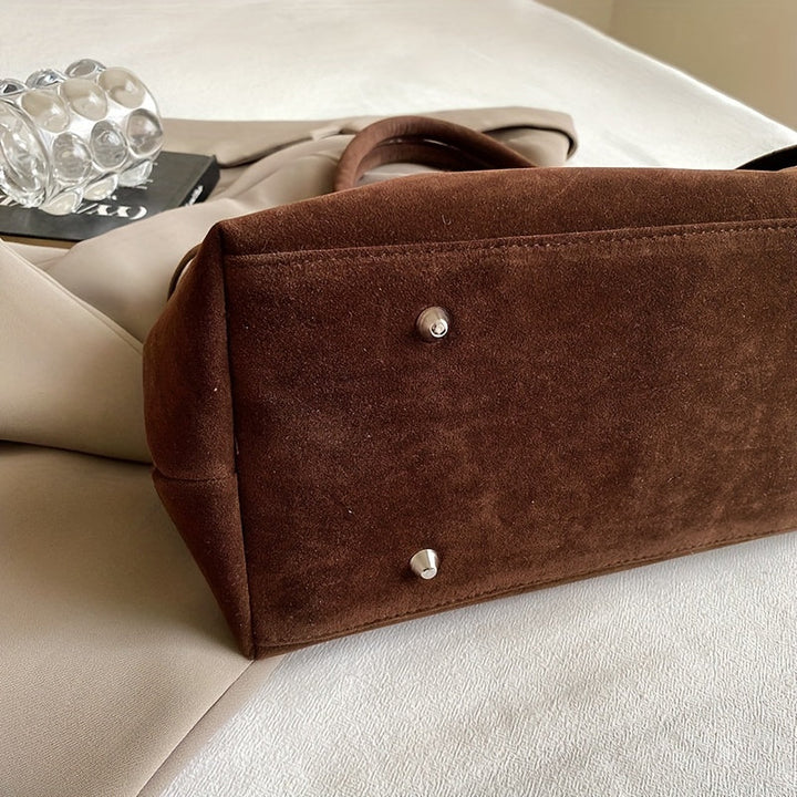 Valsenia Elegant bag with vintage suede belt