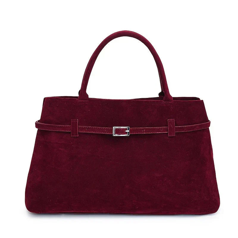 Valsenia Elegant bag with vintage suede belt