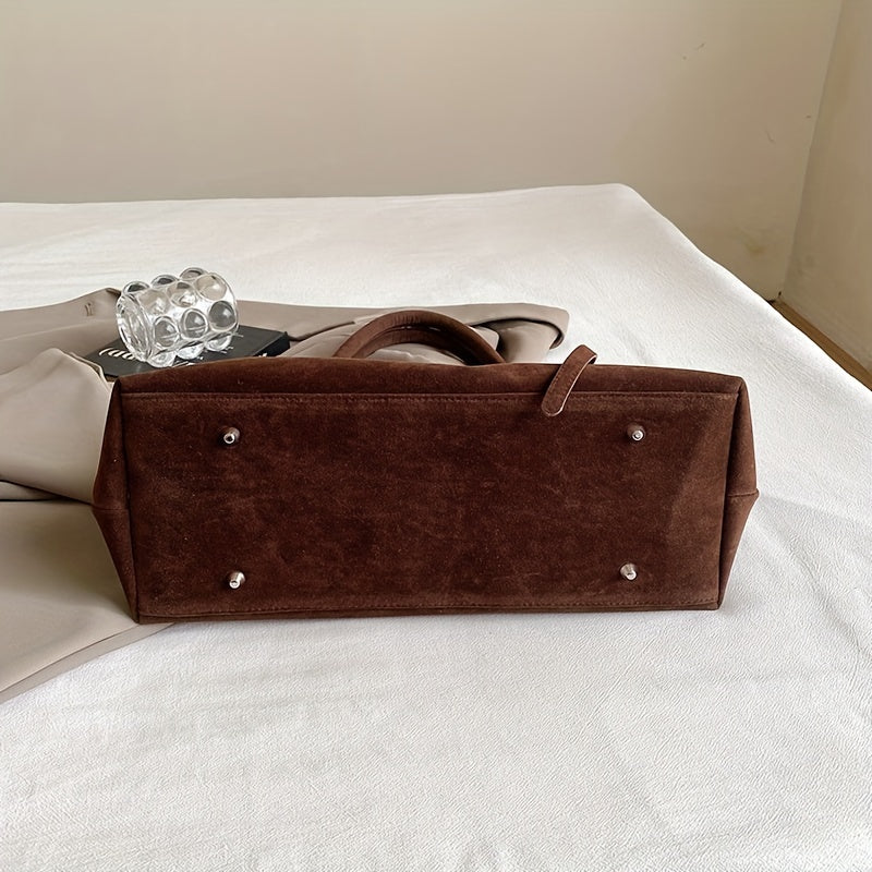 Valsenia Elegant bag with vintage suede belt
