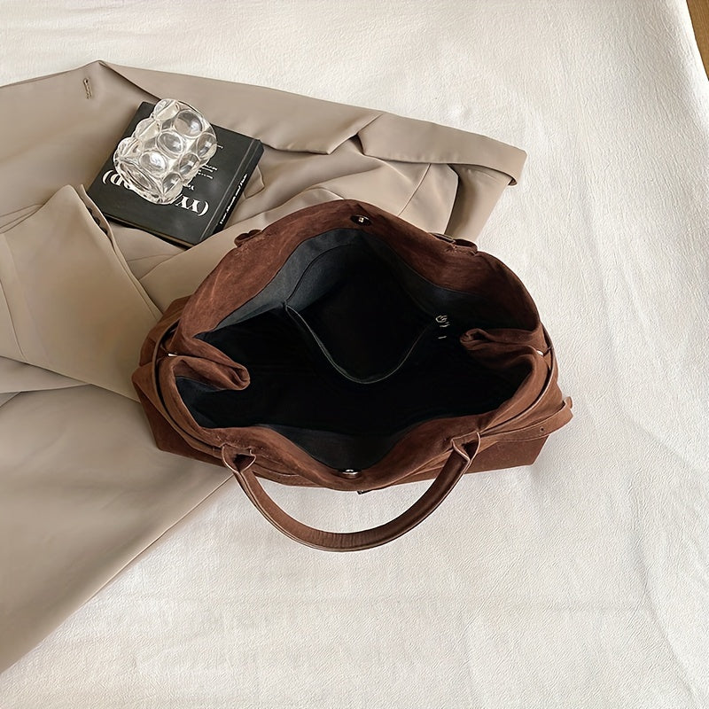 Valsenia Elegant bag with vintage suede belt