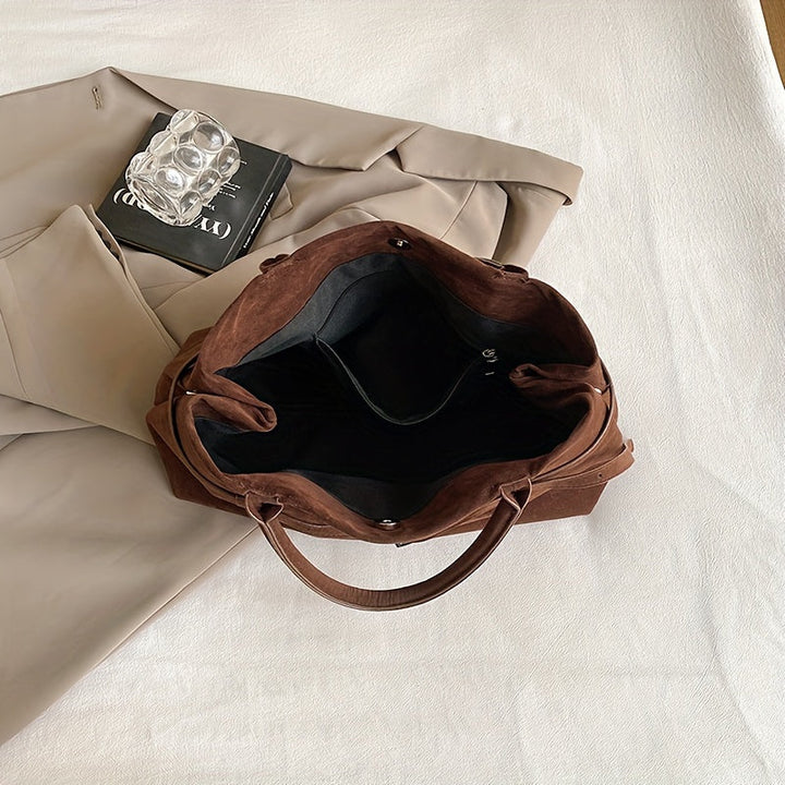 Valsenia Elegant bag with vintage suede belt